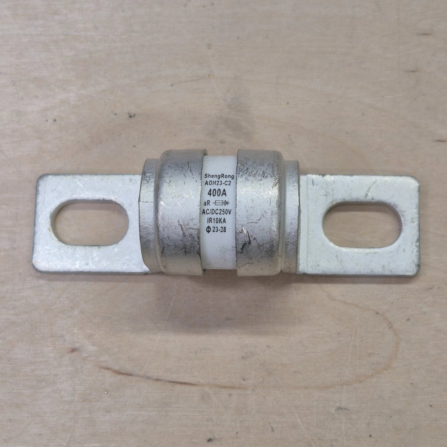 Class T fuse on wooden background