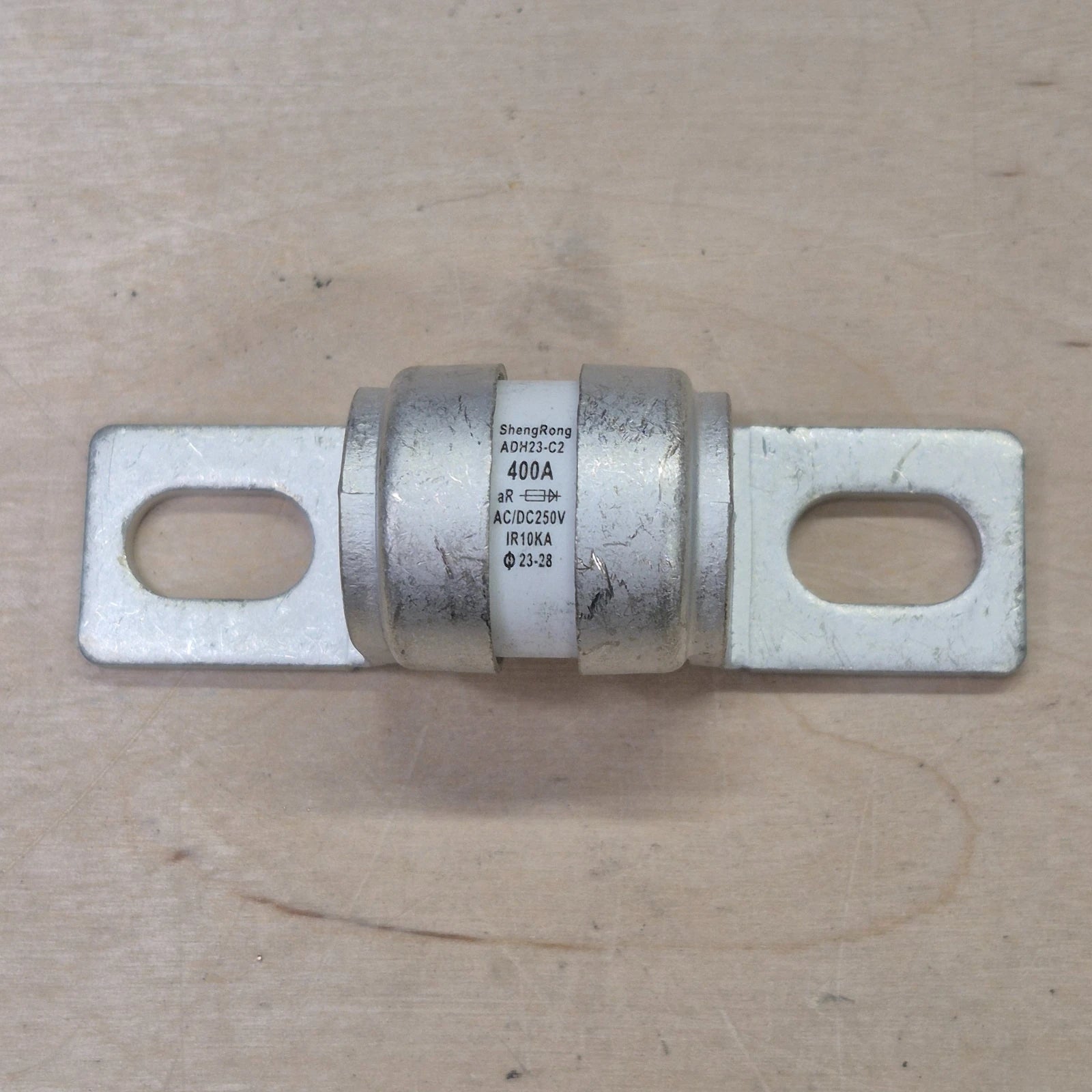 Class T fuse on wooden background