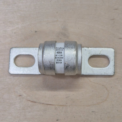 Class T fuse on wooden background