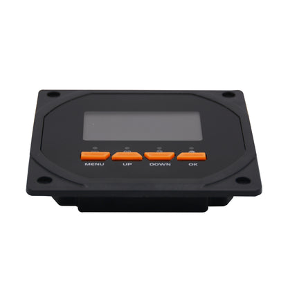 Black electronic panel with buttons and a display on a white background