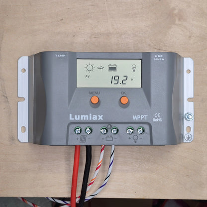 Lumiax 15A solar regulator on a wooden surface