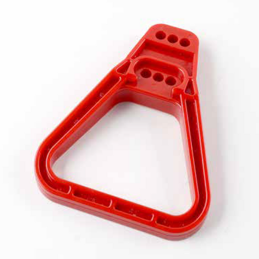 Red plastic component on a white background