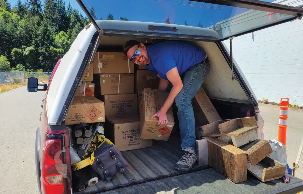 Russ taking out equipment from a van